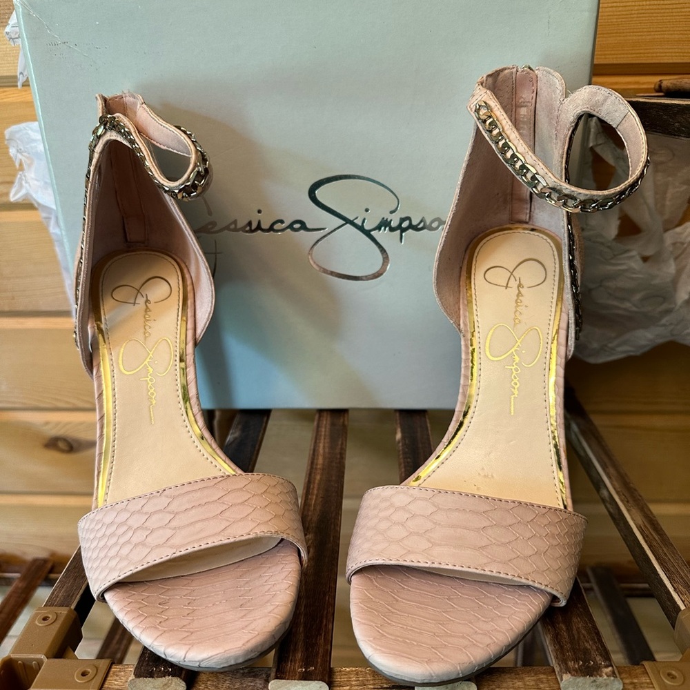 Jessica Simpson is embossed buffed snake high heels